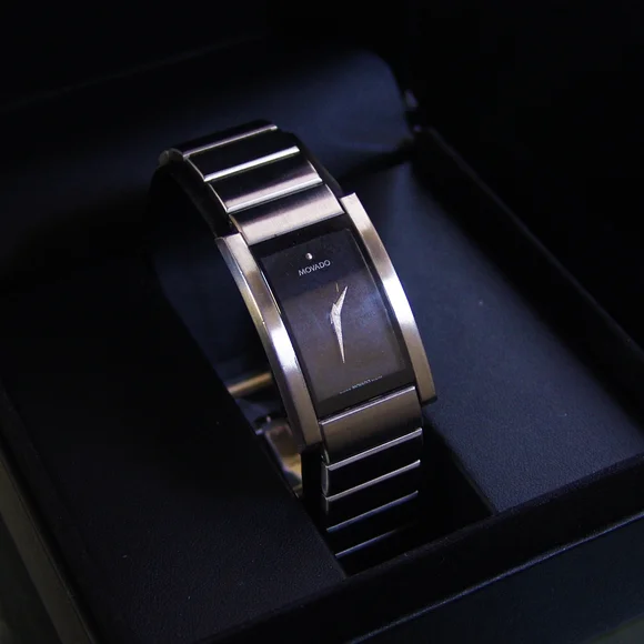 Movado Black and Silver Watch